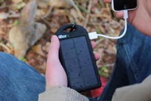 portable solar charger on phone